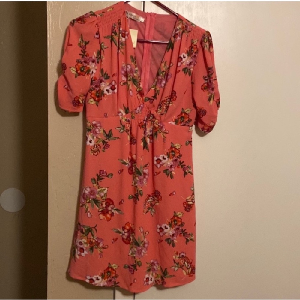 Available flower shirt by Angela Fashion small